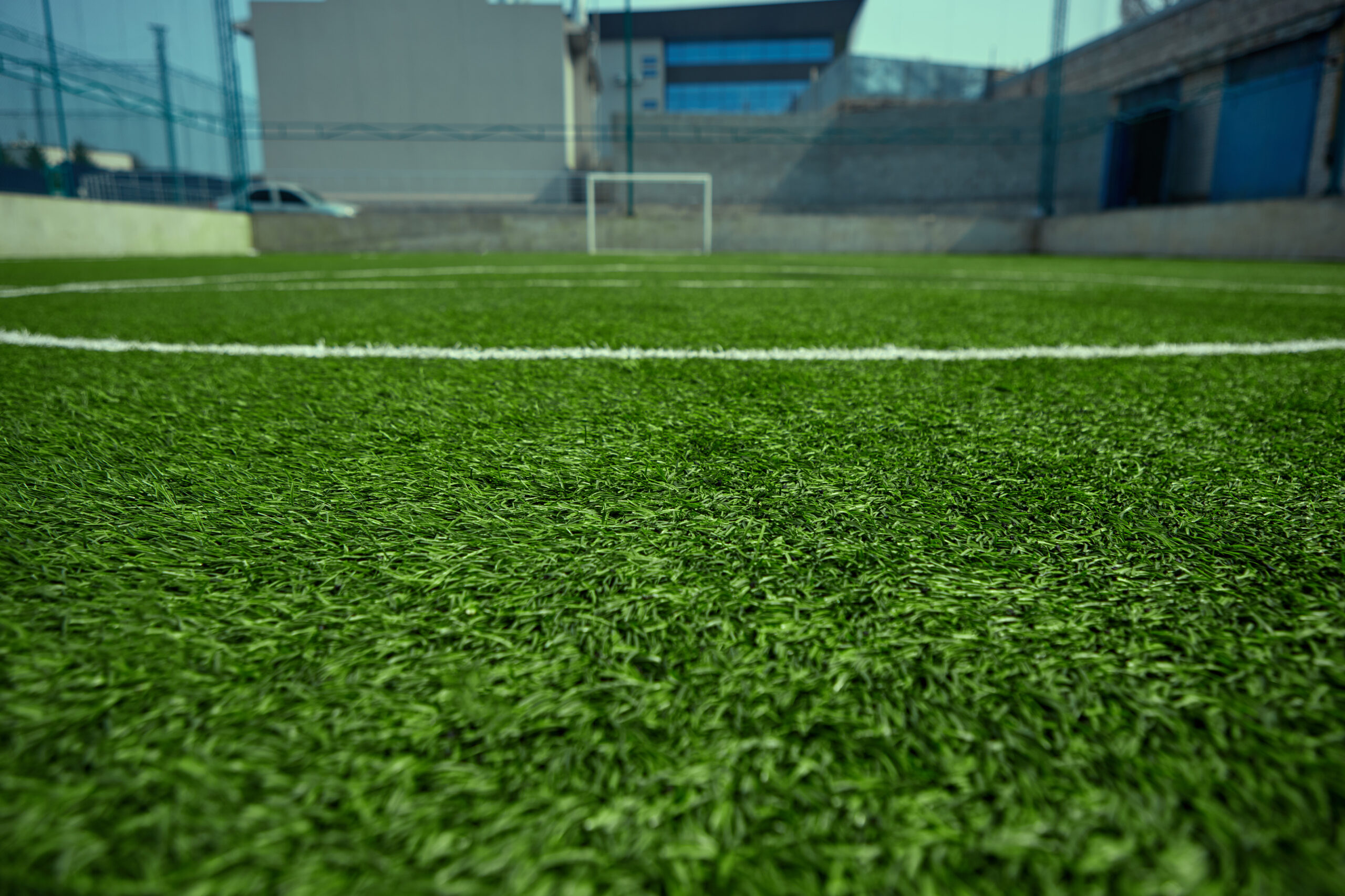 The empty football field and green grass